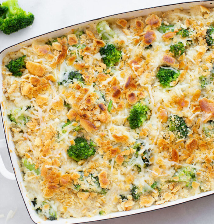 A casserole dish with cheesy broccolii dish